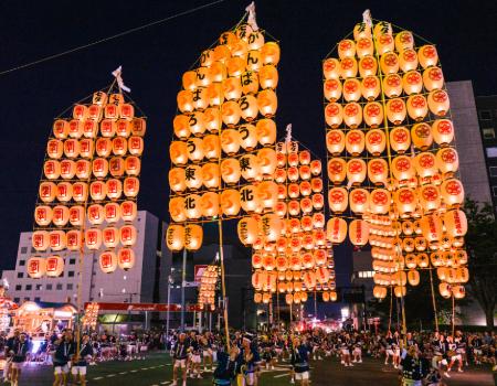 Bright orange lanterns Akita Kanto Festival in Japan on a special/festival tour